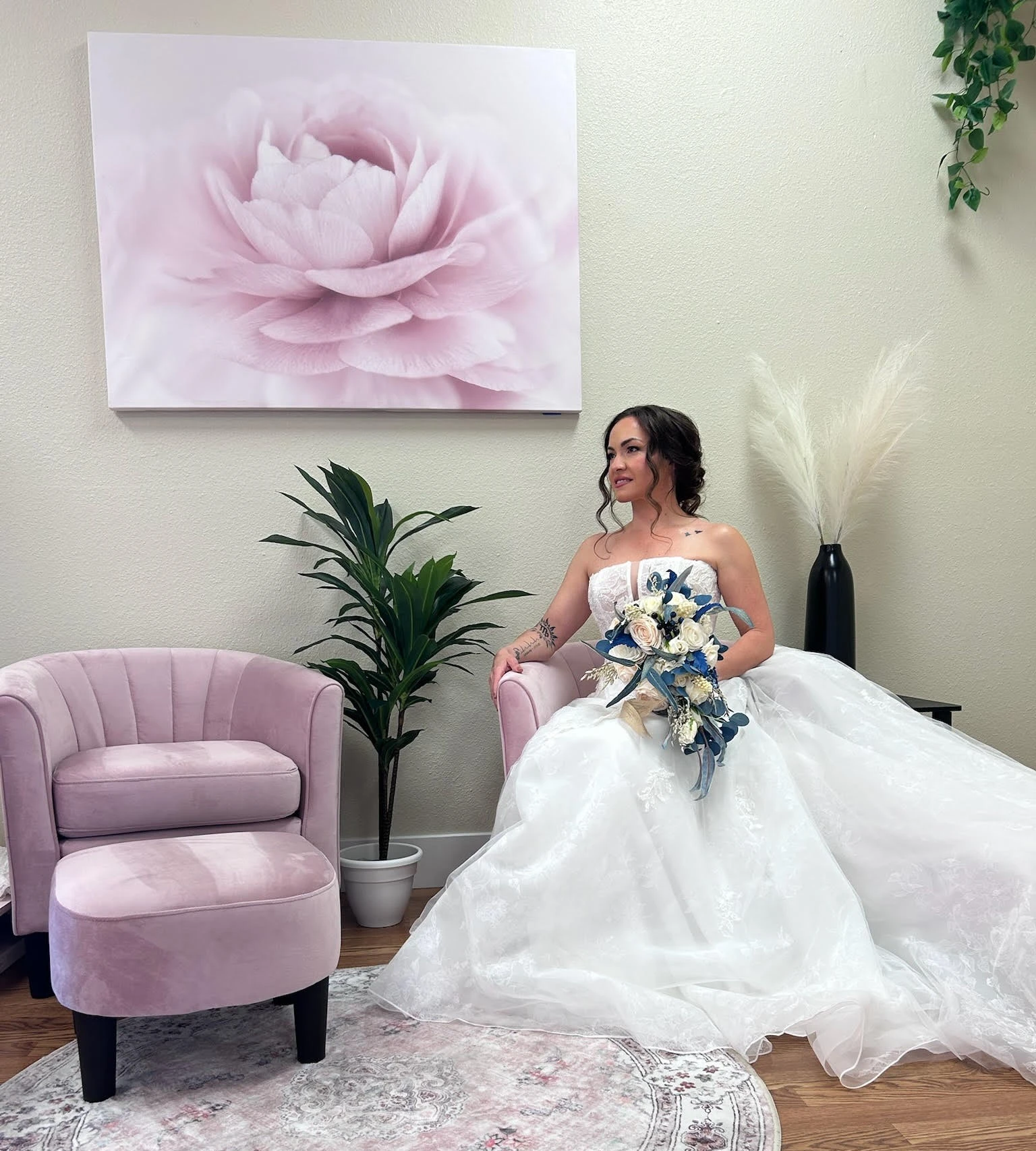 A bride sits in her gown