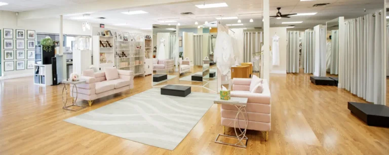 Ohana Bridal reception room with seating and curtained areas for trying on gowns.