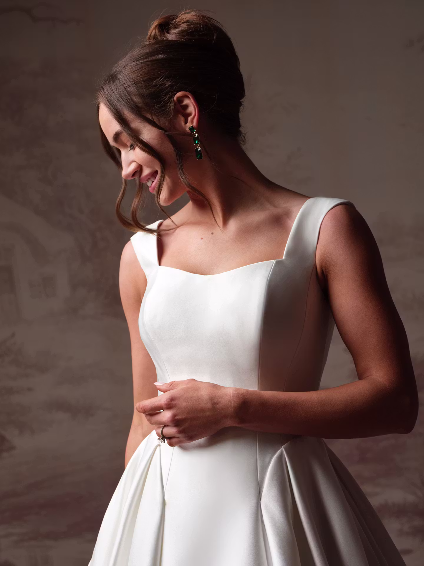 Pierce by Maggie Sottero modest satin A-line wedding dress with a sweetheart neckline, square back, tank straps, and hidden pockets.
