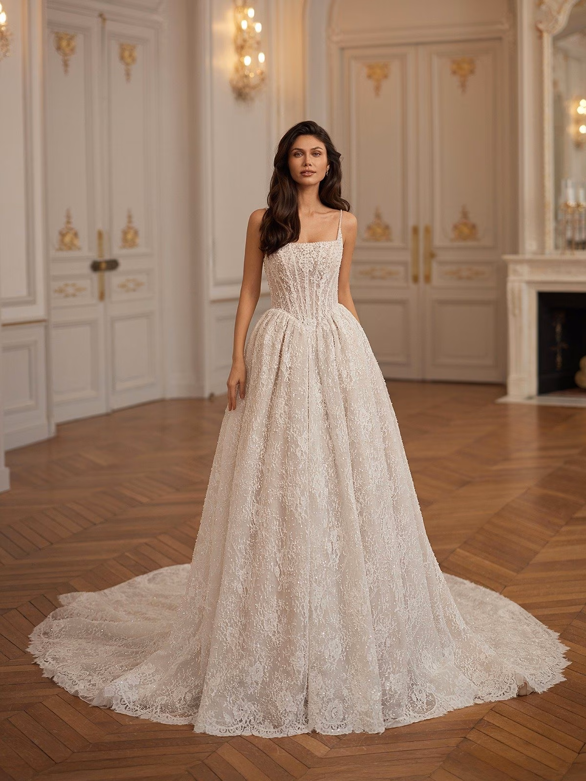 Highgrove by Val Stefani romantic A-line wedding dress with rose lace, a square neckline, beaded straps, a basque waist, and an illusion V-back.